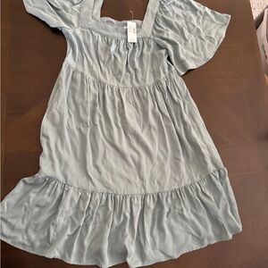 Woman’s light green/blue Dress